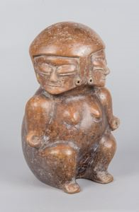 Image of molded pottery vessel, janus figure